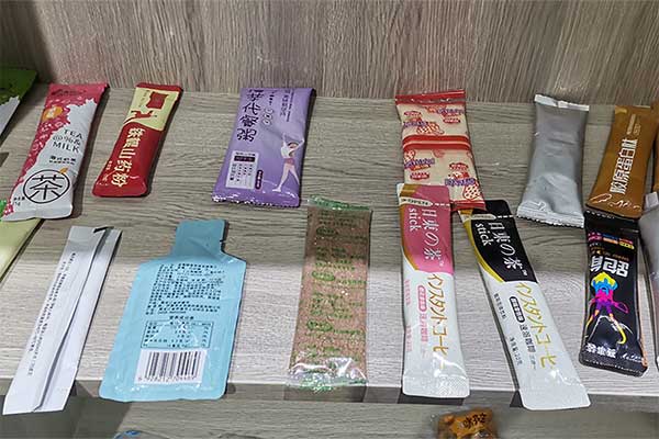 奶茶粉末包裝機可采用三邊封、四邊封、圓角袋型